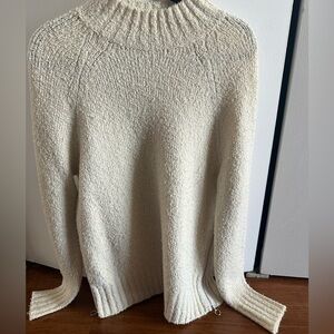 Lacoste Wool Cream Mockneck Sweater with Side Zippers.